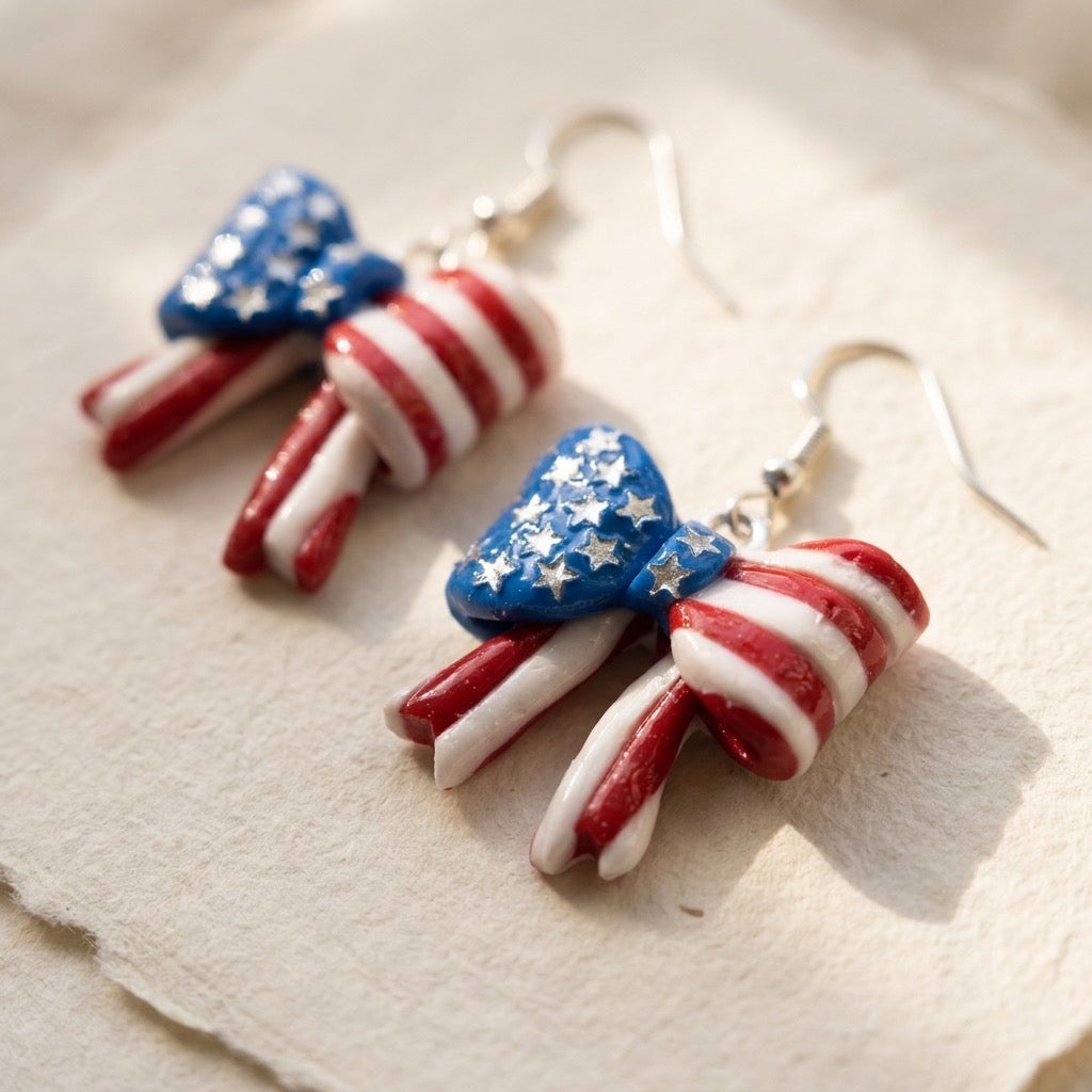 Stars & Stripes Bow Dangle Earrings – Handmade Patriotic Polymer Clay Earrings