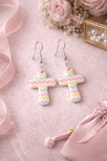 Sweet, soft pastels meet timeless faith with these Pastel Chevron Cross Earrings